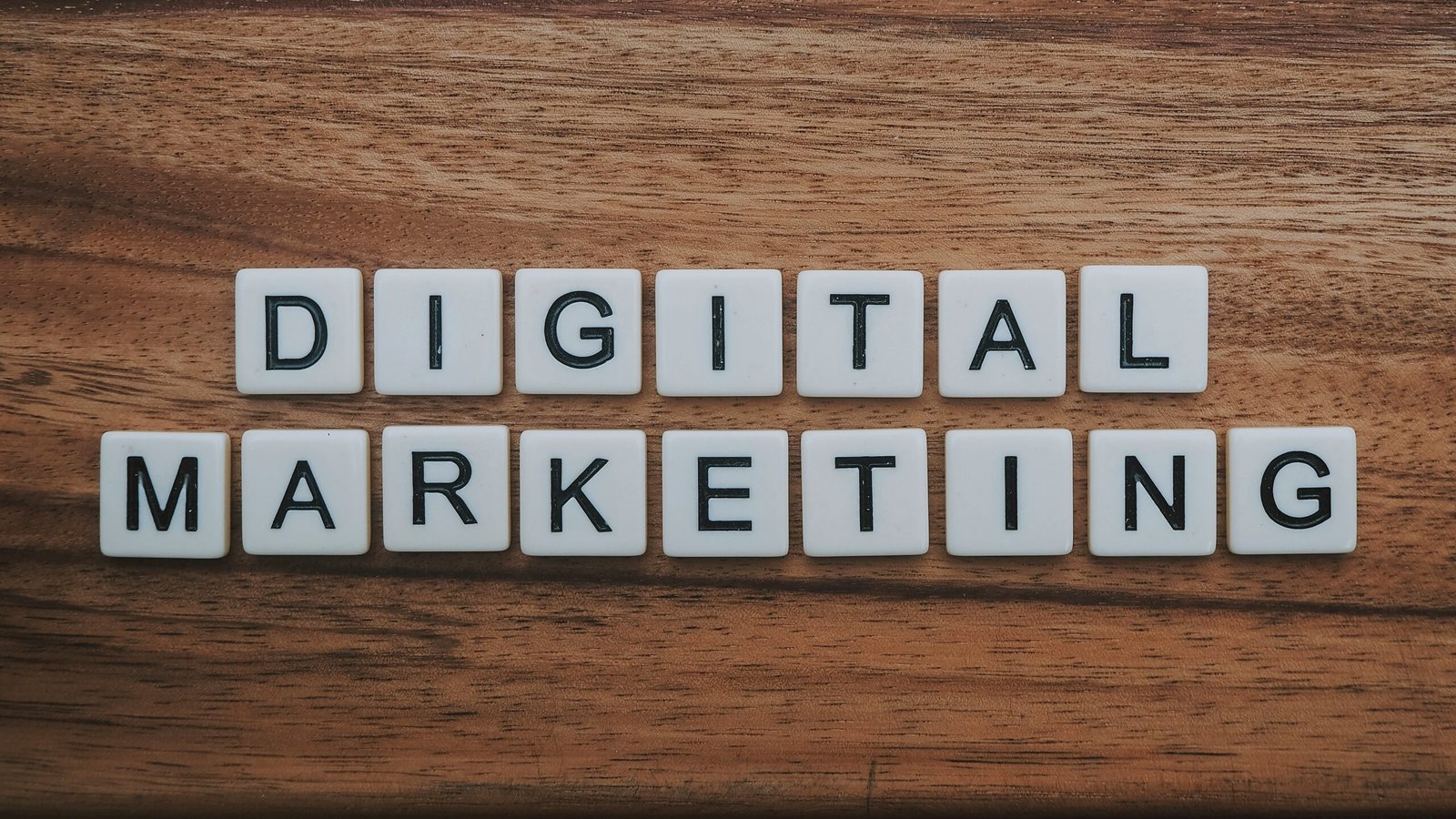 tiles that spell out digital marketing with a wood backdrop
